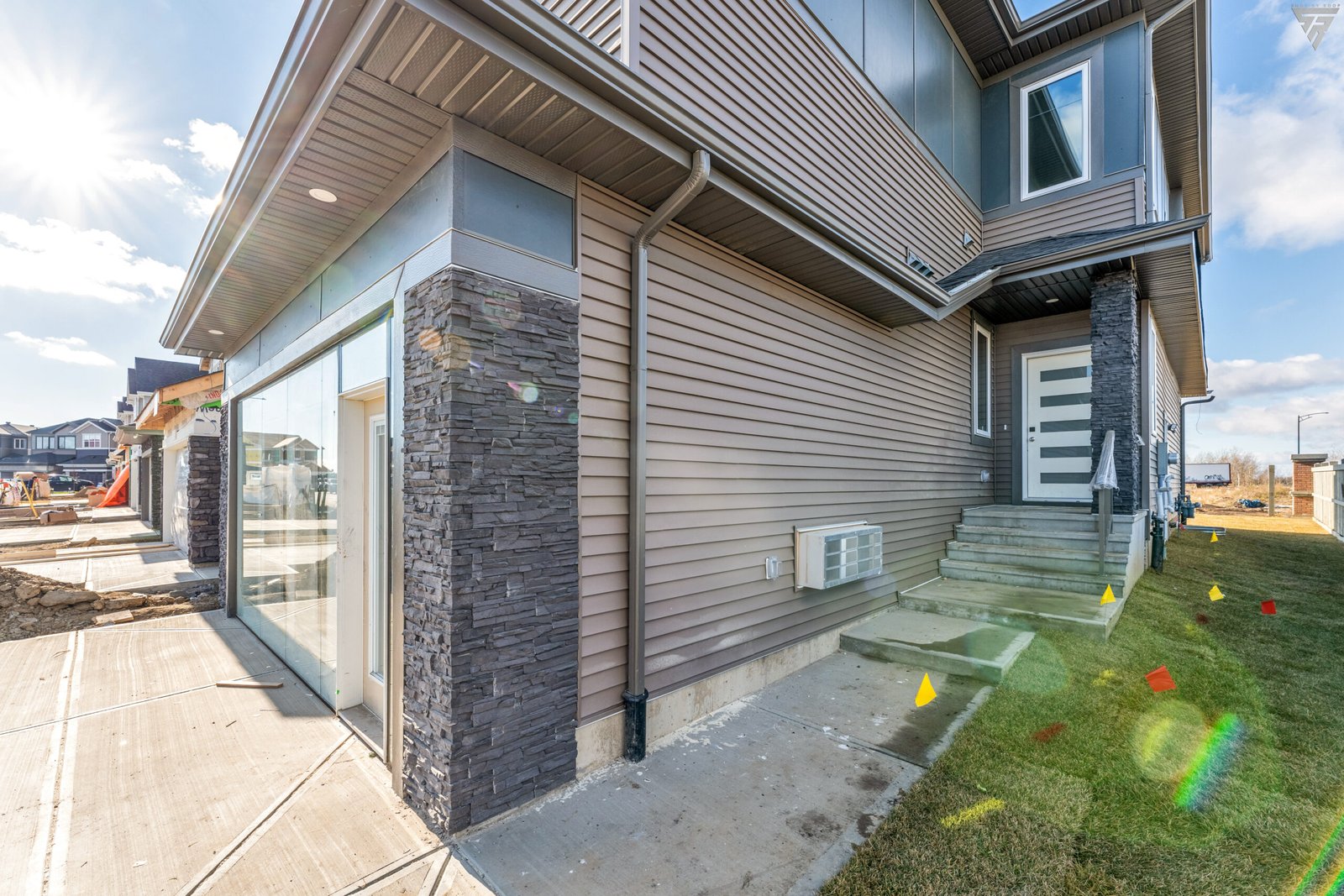 Corner lot house with lawn for sale